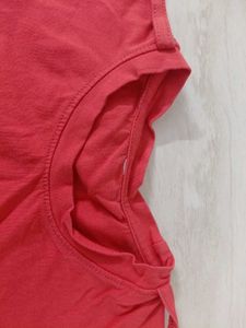 white dungaree with orange tshirt