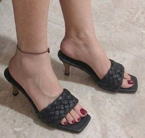 Chic Black Woven Heeled Mules