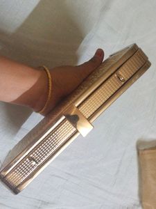 Beautiful Golden Clutch For Party Wear Used Once And Kept As It Is..