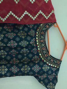 Silk green colour Anarkali salwar with red colour Shawl.Used only once good condition