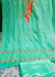Elegant Green Kurta Set with Orange Embroidery wit