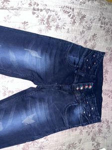Dark Wash Flare Jeans with Embellishments
