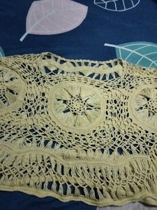 It is a yellow shrug.