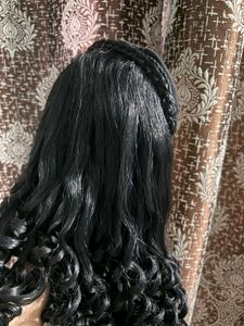 BLACK CURLY WIG WITH BRAID ACCENT