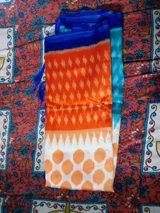Vibrant Orange & Blue Ikat Saree