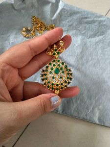 Stunning Gold Necklace with Green Stones