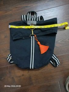 Stylish Black Backpack with Tassel