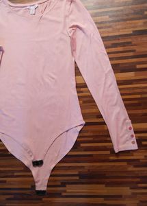 Peach Full-Sleeve Bodysuit by Amisu