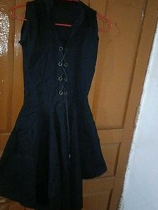 Sleeveless Black Dress with Lace-Up Front