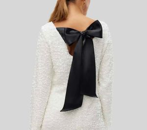 Sparkling Sequin dress with Black Ribbon Detail