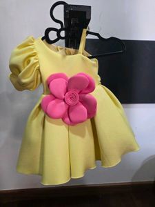 Cute Yellow Dress with Pink Flower Accent