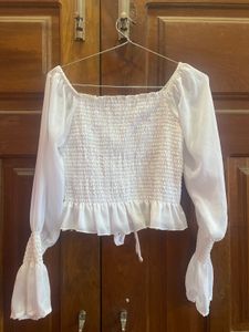 Chic White Smocked Blouse with Bell Sleeves