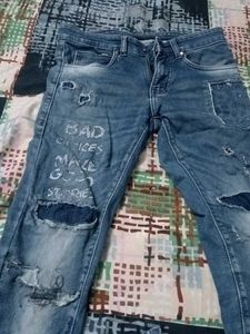 Distressed Blue Denim Jeans