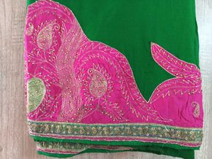 GREEN CHIFFON SAREE WITH PiNK EMBROIDERY