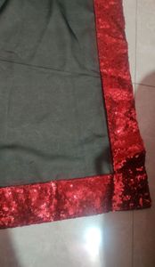Black saree with Red sequin border