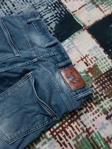 Distressed Blue Denim Jeans