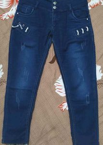 Stylish Blue Denim Jeans with Grommet Details