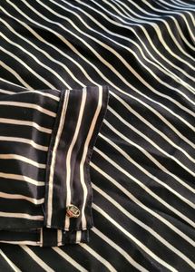 Chic Striped Button-Up Dress with Floral Accent