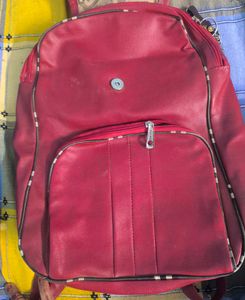 Stylish Red Backpack with Plaid Detail
