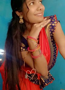 Vibrant Orange Saree with Embellished Border