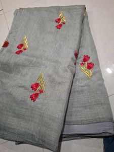 Elegant Grey Saree with Red Floral Embroidery