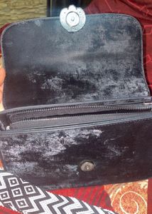 Stylish Black Crossbody Bag with Patterned Strap