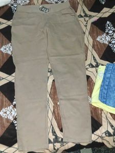 Stylish Beige Trousers with Buckle Detail