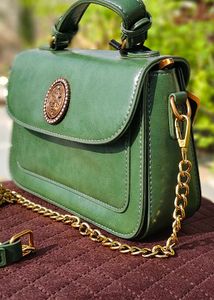 Chic Green Handbag with Gold Accent