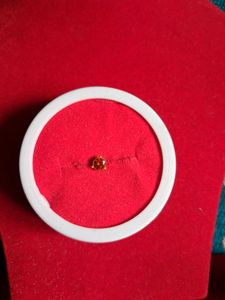 beautiful orange color nosepin  gold