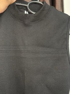 Sleeveless Mock Neck Ribbed Top