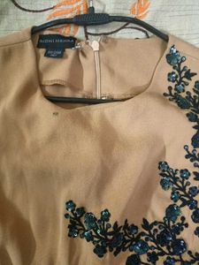 Elegant Beige Jumpsuit with Embellishments