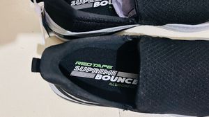 Red tape Stylish Black Slip-On Sneakers