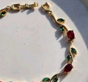 Elegant Gold Bracelet with Red &amp; Green Stones