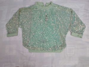 Sparkling Sequin Top with Elegant Pleated Pants