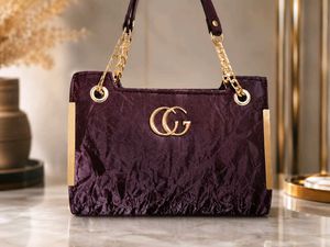 Stylish Plum Handbag with Gold Chain
