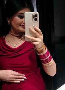 Elegant Red Gown with Embellished Waist