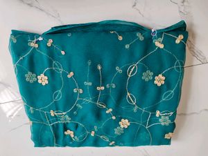 Exquisite Teal Peacock Embroidered Saree