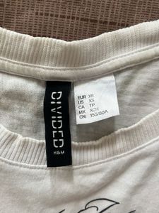 Chic White Graphic Tee with Bow Detail