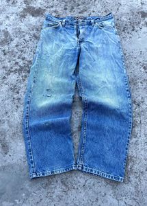 Distressed Blue Denim Jeans