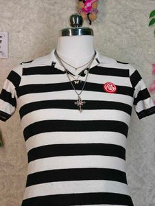 Women's black and white striped polo tee