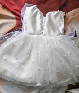 Elegant White Baby Dress with Purple Bow