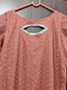 Elegant Peach Kurta with Unique Neckline