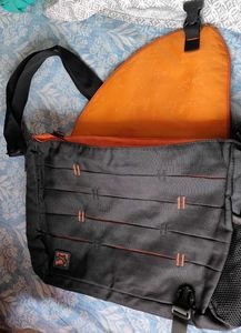 Black and orange bag with adjustable straps