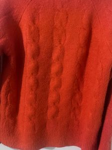 orange light weighted sweater