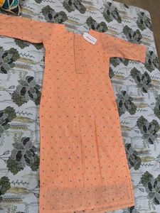 Peach Kurta with embroidery and golden lace work