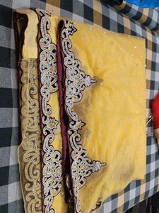 Stunning net Yellow Embroidered Saree