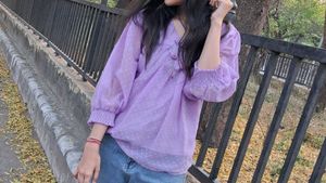 women dark levender color top with dobby print