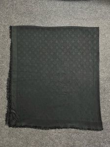 Elegant Black Fringed Scarf
