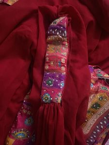 Red plazzo with stone work multi colour top