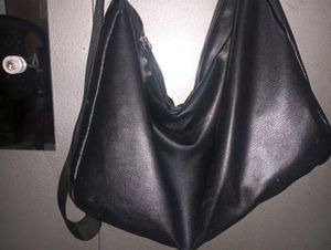 Black leather bag with adjustable strap